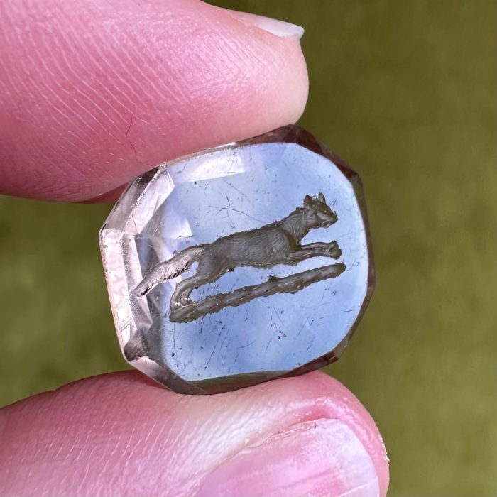 Smoky quartz intaglio seal featuring a running fox