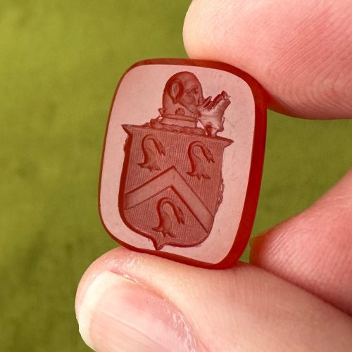 North south rectangle carnelian heraldic intaglio, featuring a shield with an elephant on top