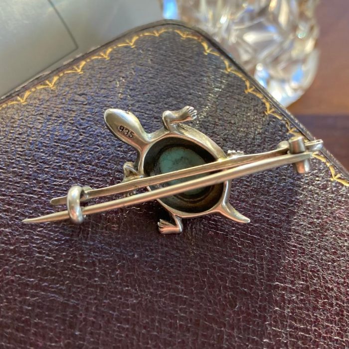 Silver and turquoise cabochon tortoise brooch from back