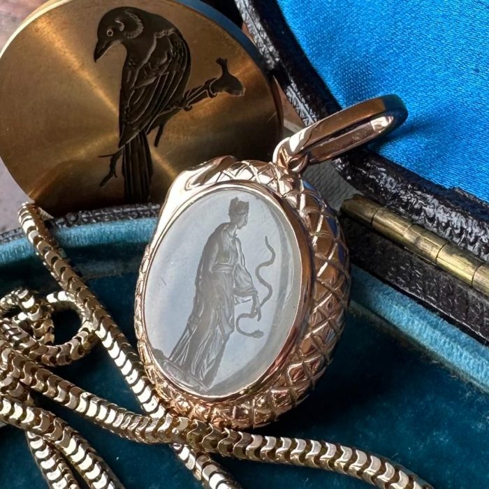 Gold ourboros intaglio seal pendant